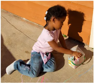 Preschool Child Engaging In Solitary Play By Independently Building With Blocks 1777471225252