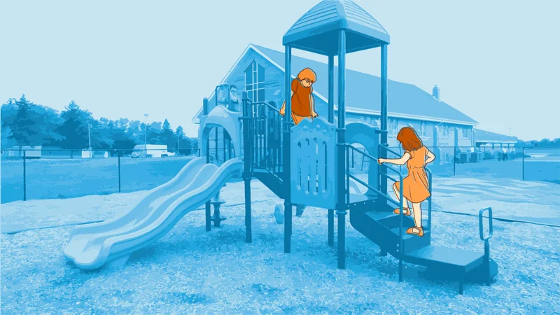 Children playing on a playground outside a school