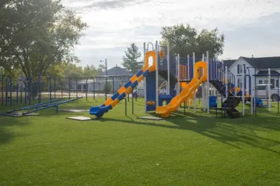 Maintained public playground reflecting planned upkeep and long-term management.