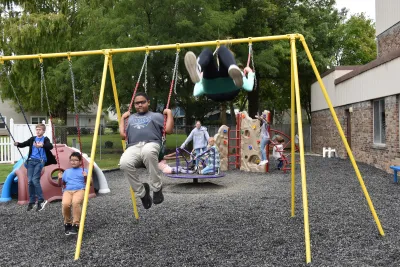 kids playing on swing set