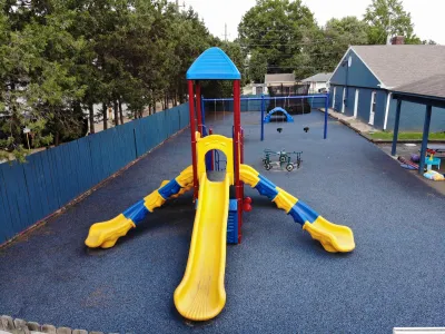 swing set on poured-in-place rubber